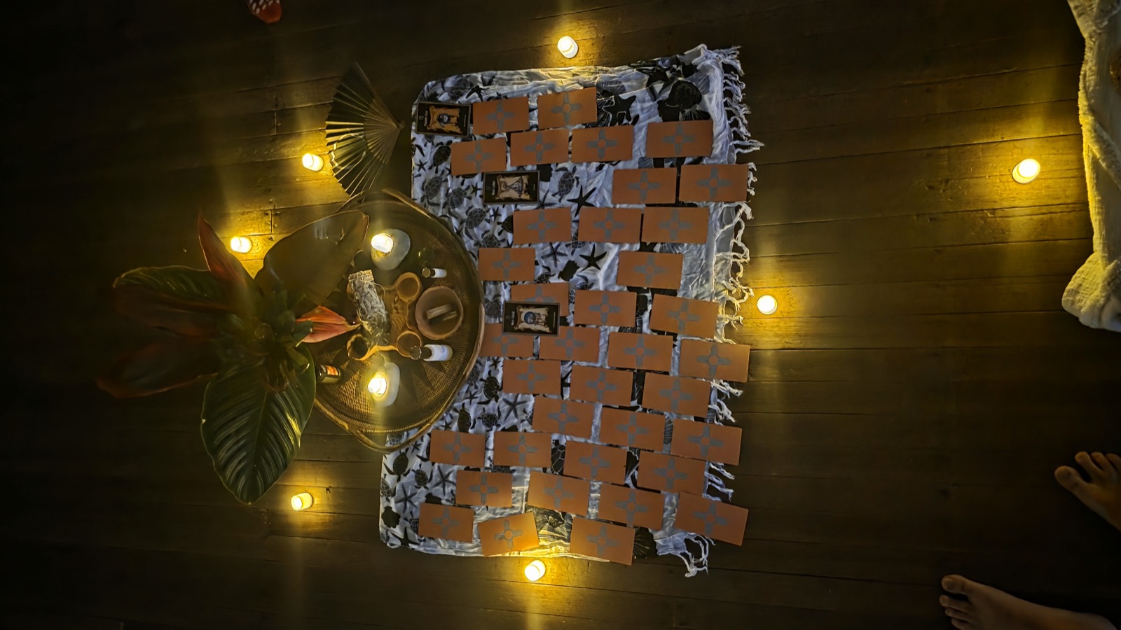 Intention cards laid around the centrepiece